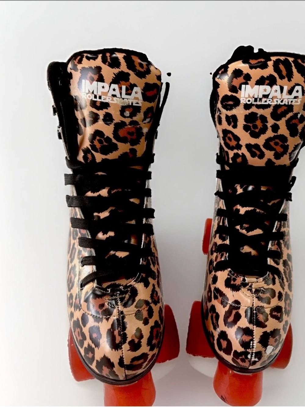 IMPALA Leopard Print Roller Skates in Brown with Red Wheels